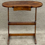Kidney pedestal table