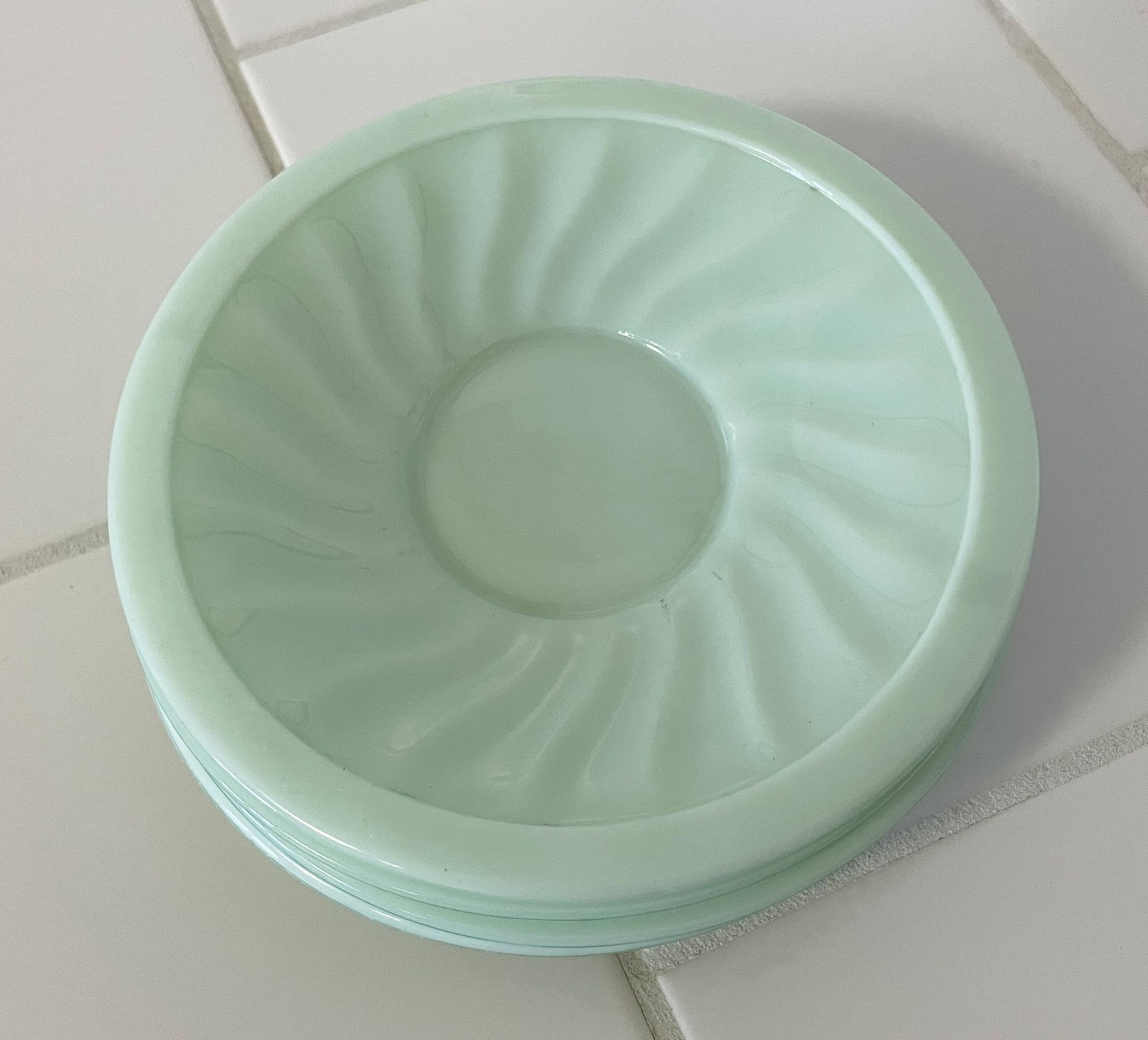 Set of 4 mint green opaline saucers with a swirl pattern, made in France.