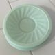 Set of 4 mint green opaline saucers with a swirl pattern, made in France.