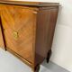 Antique art deco sideboard from the 1930s with veneered wood and bronze insert