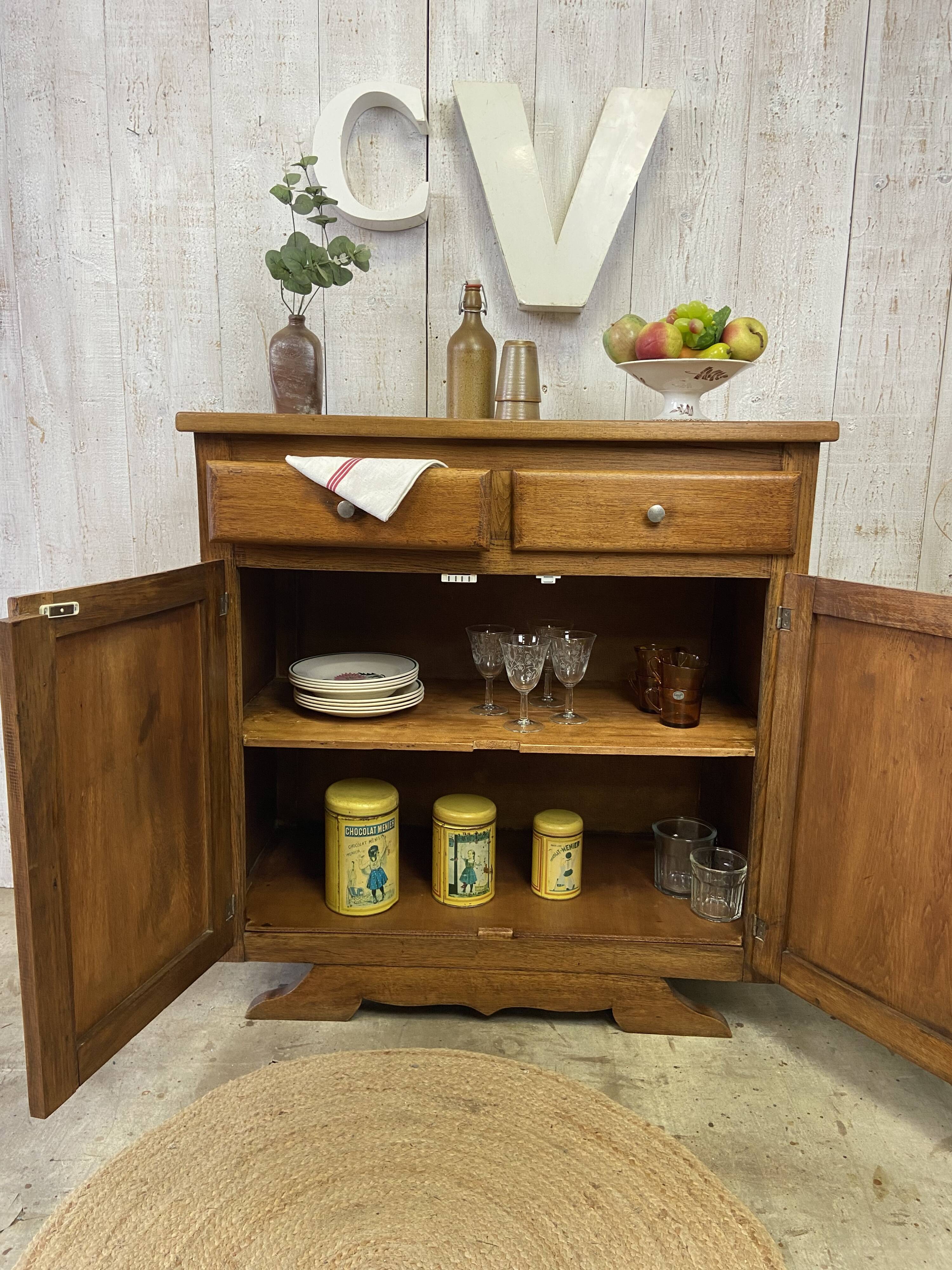 Vintage sideboard with "moustache" base