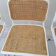 B32 chairs by Marcel Breuer in white.