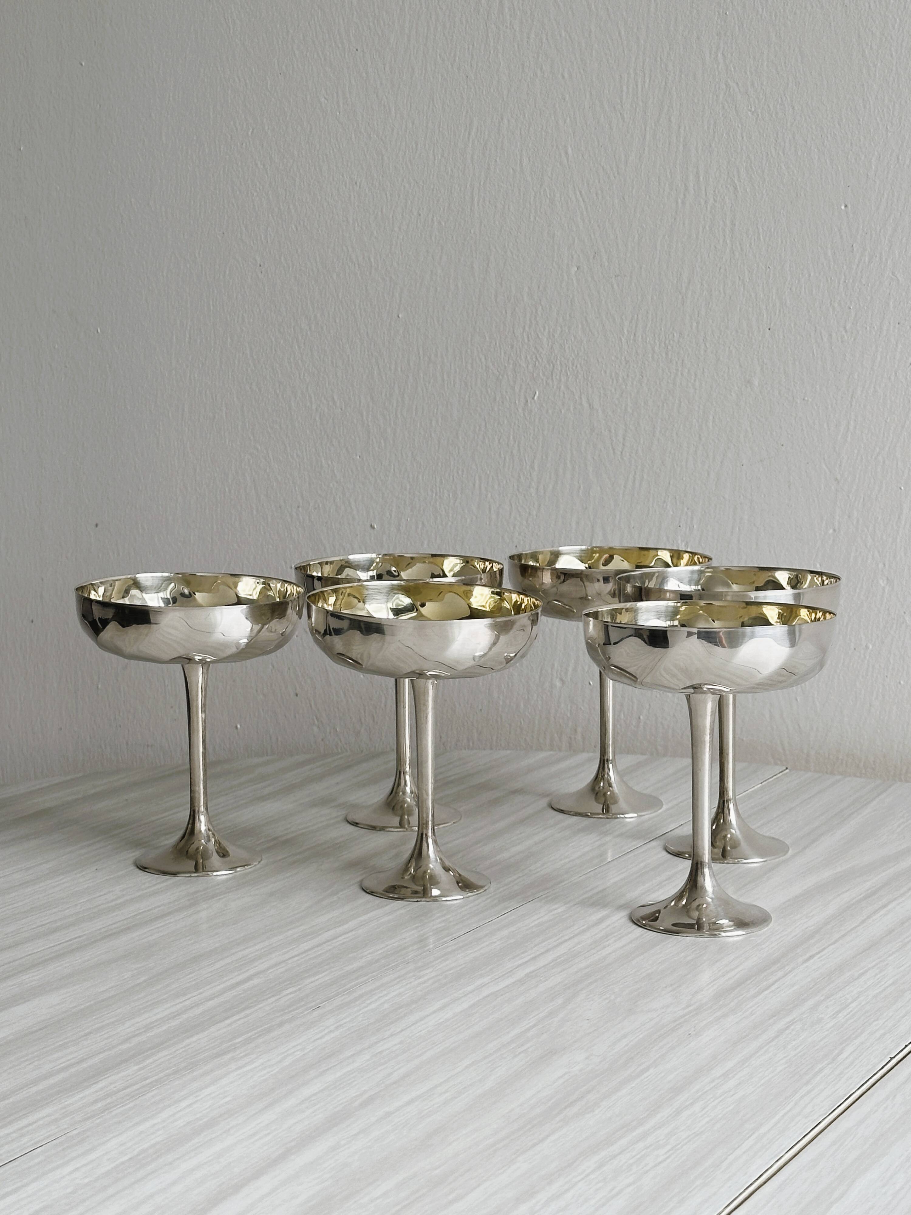 6 shiny metal footed bowls