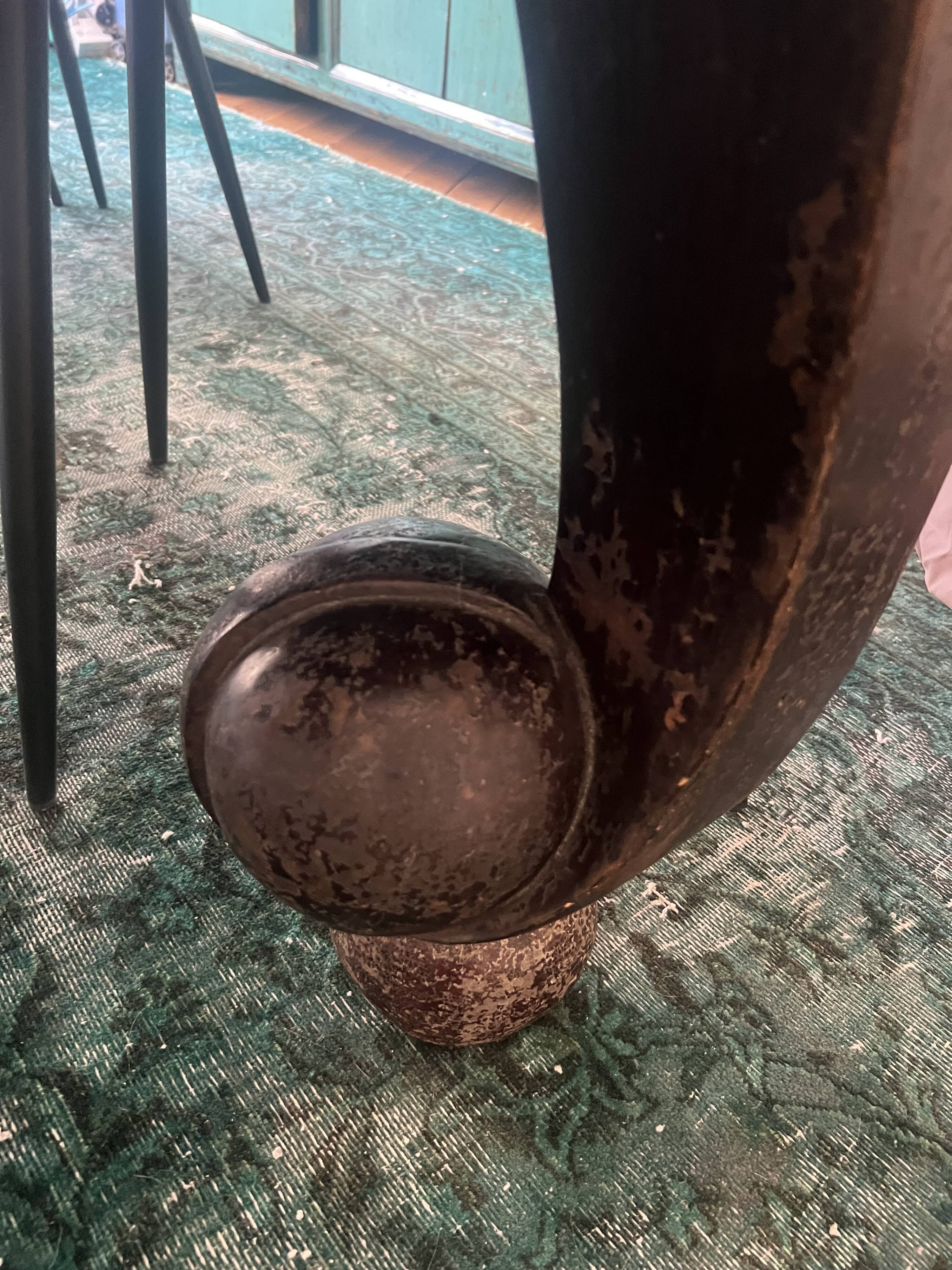 Large antique Chinese black table made of patinated solid wood.