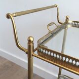 Neoclassical style rolling table in brass