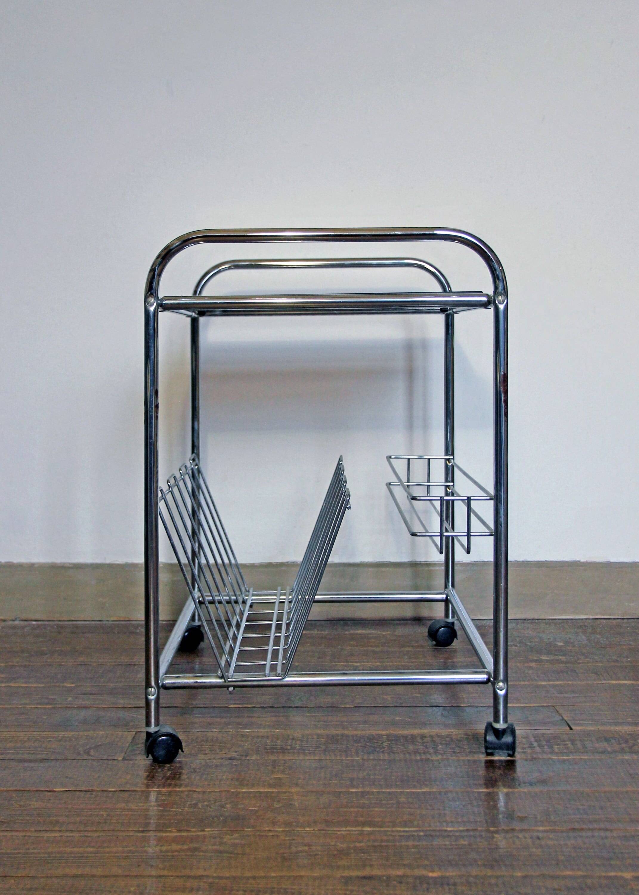 Stainless steel magazine holder side table