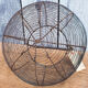 Old basket has wire eggs