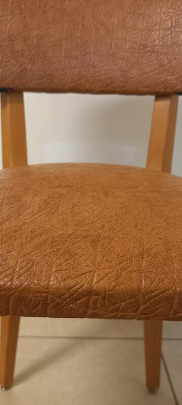 Set of 4 vintage chairs in solid beech and caramel faux leather.