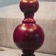 Turned wood table lamp in plum color - 1970s