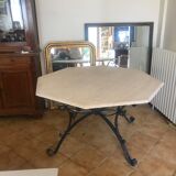 Travertine and wrought iron dining table