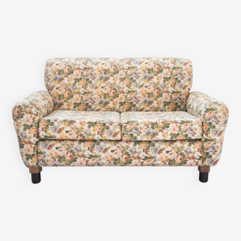 2-seater sofa, floral fabric, wooden structure, plastic and wooden legs, 1970