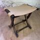 Colonial style leather armchair and ottoman