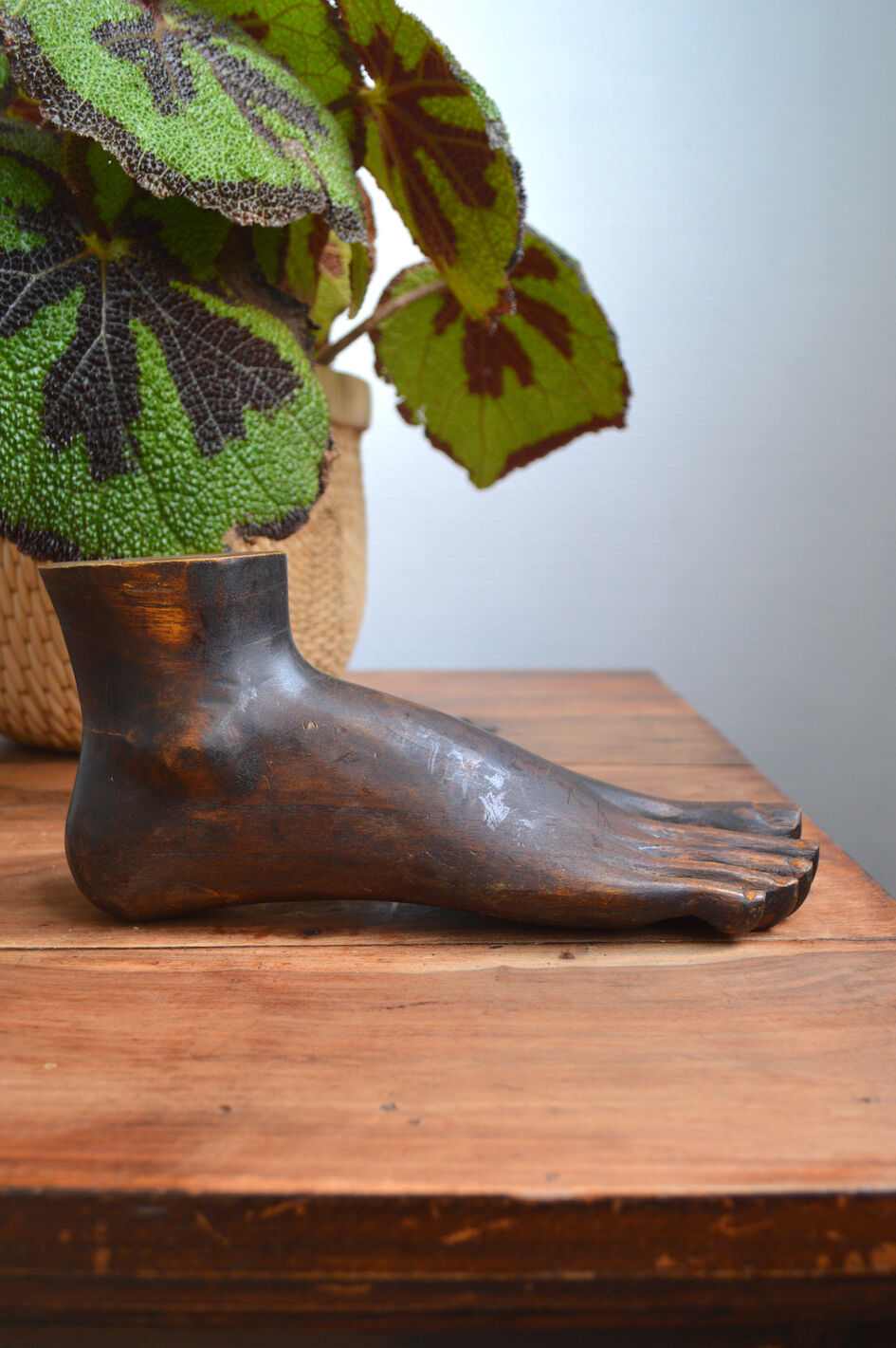 Carved wooden Buddha's foot
