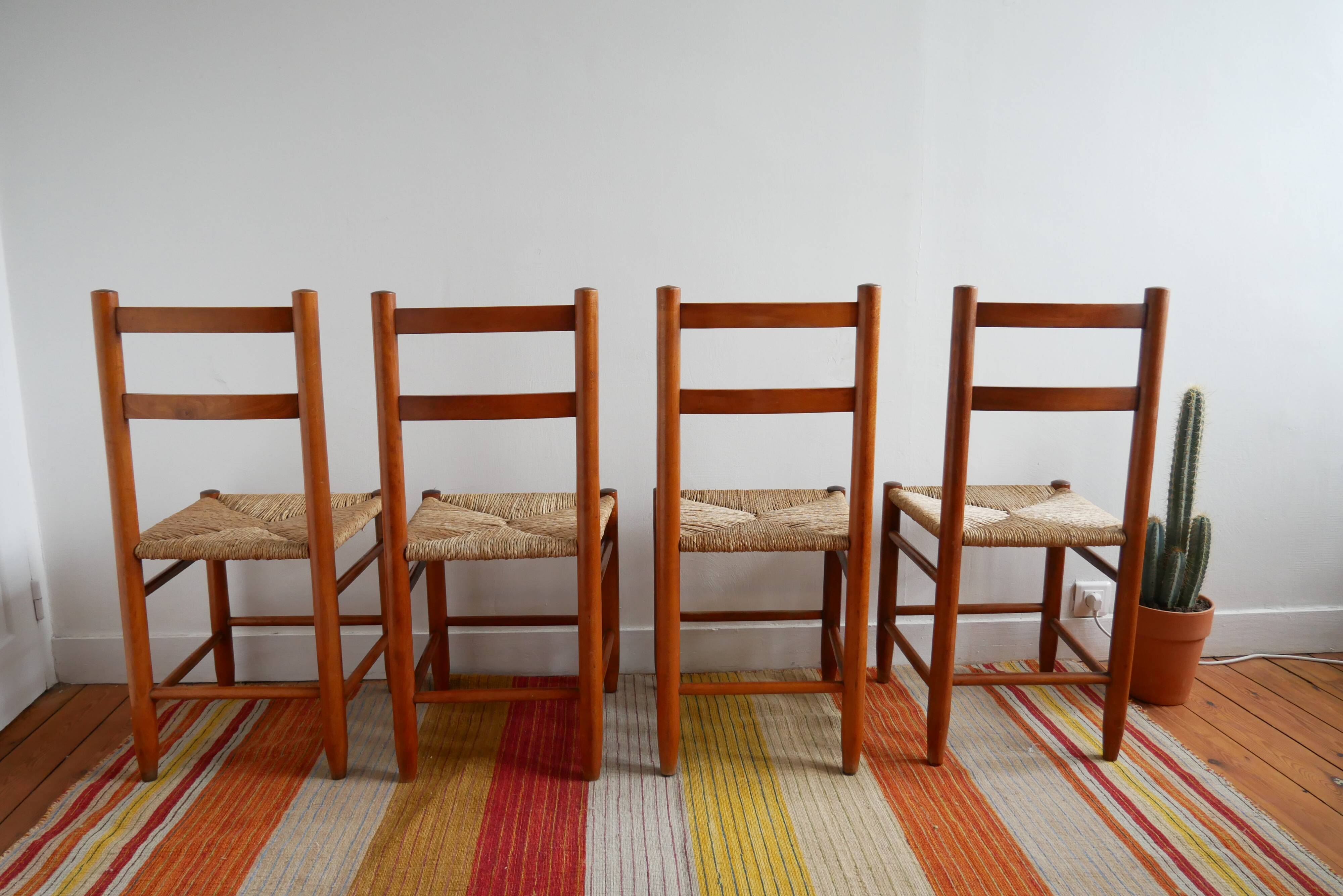 Set of 4 straw chairs and a stool