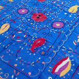 Midnight blue suzani kilim rug with embroidered patterns