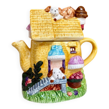 Vintage teapot in majolica – House of puppies