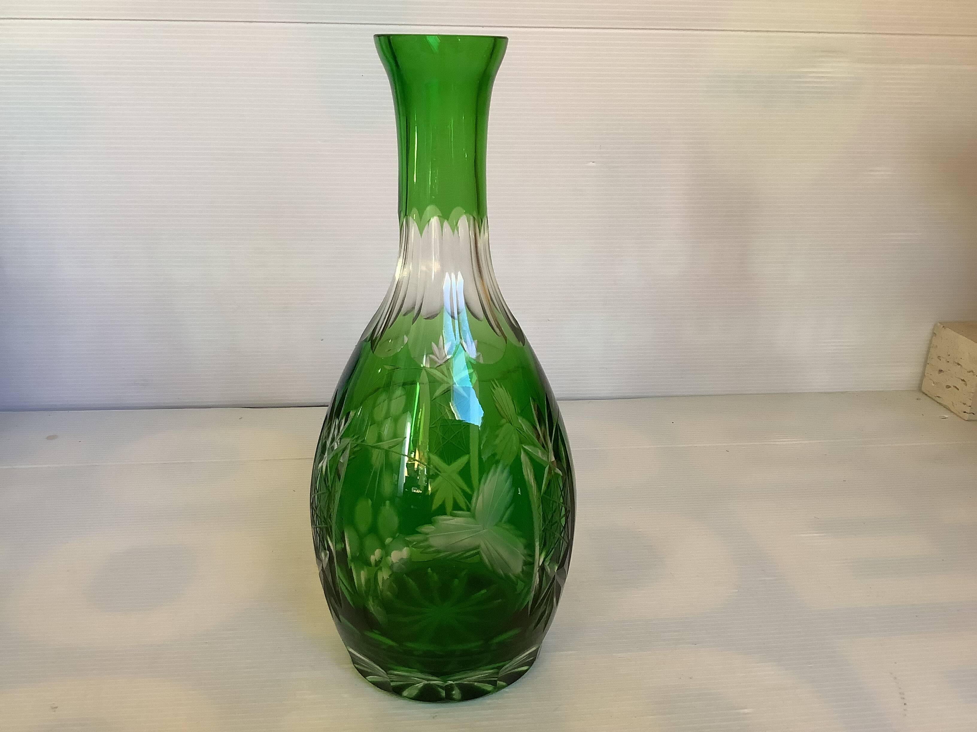 Green cut crystal bottle