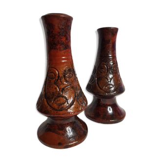 Pair of old enamelled terracotta candlesticks