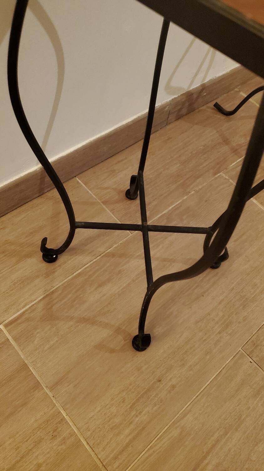 Wrought iron plant holder