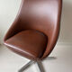 Fauteuil pivotant années 70 simili cuir