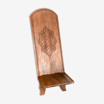 African carved wooden chair