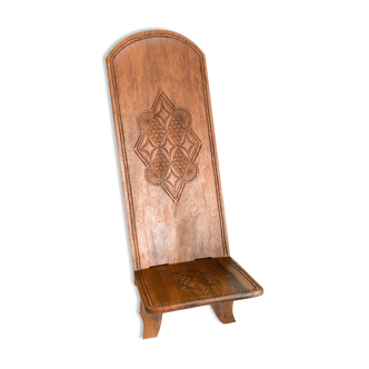 African carved wooden chair