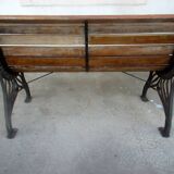 Small garden bench, with cast iron legs.