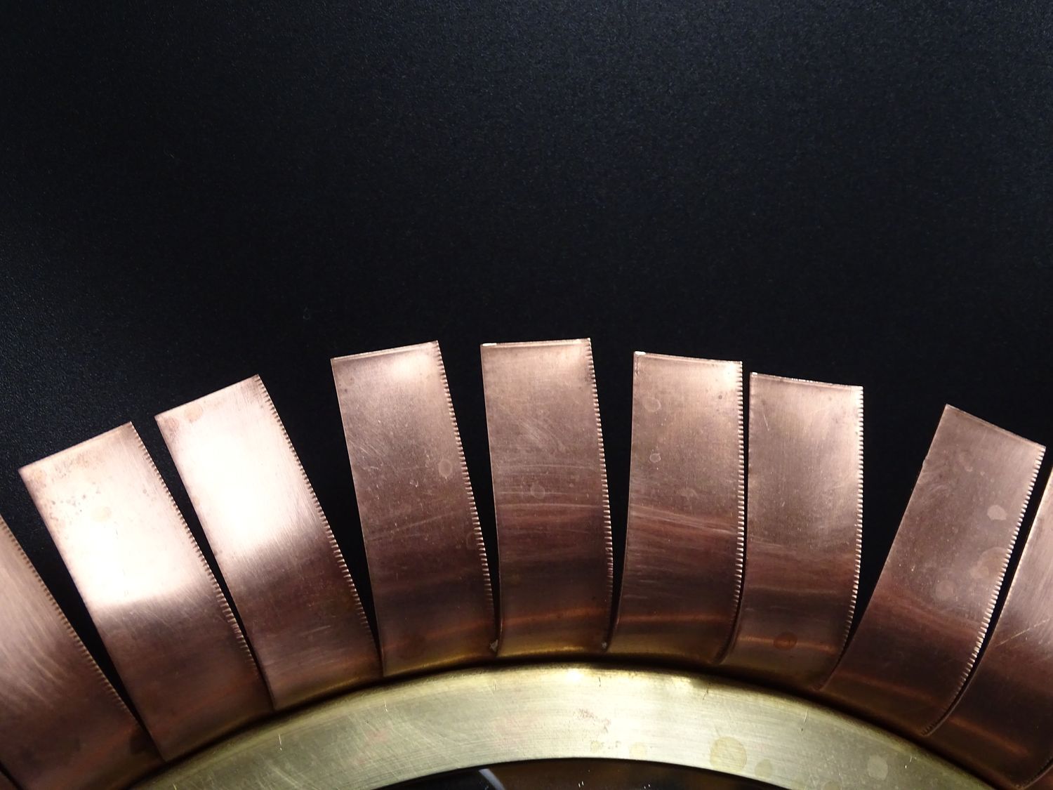 Round mirror in cut copper, sun-shaped  1970