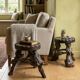 Pair of tripod stools with vine legs, oak top.