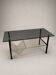 Vintage coffee table with smoked glass, black metal and brass — 1970s