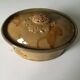 Old terrine of pastry or foie gras in beige glazed earthenware with brown drips. Very beautiful pa