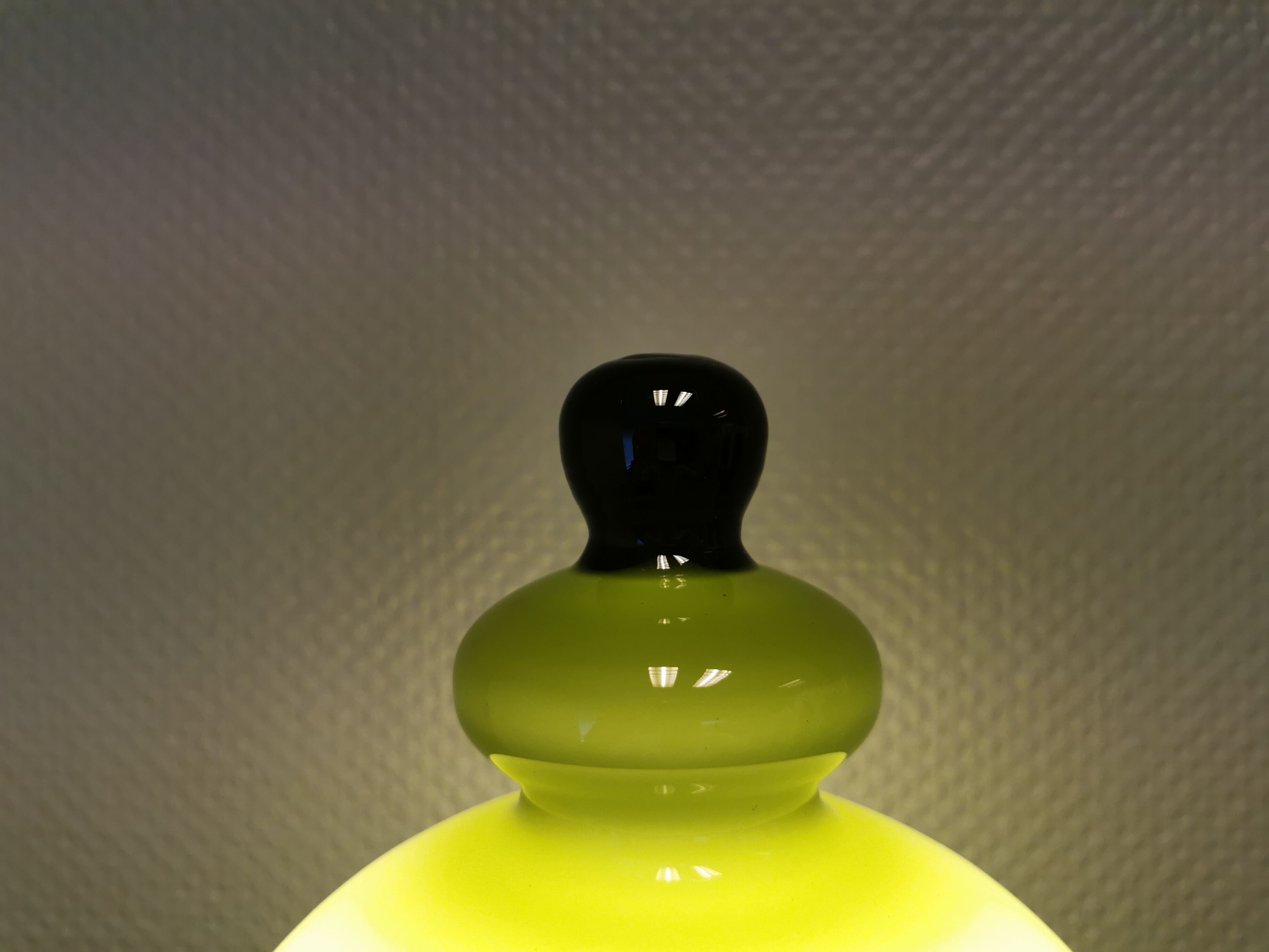 Wall light, made in black metal frame with olive green glass shade