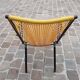 Folding chair in red scoubidou and black metal structure