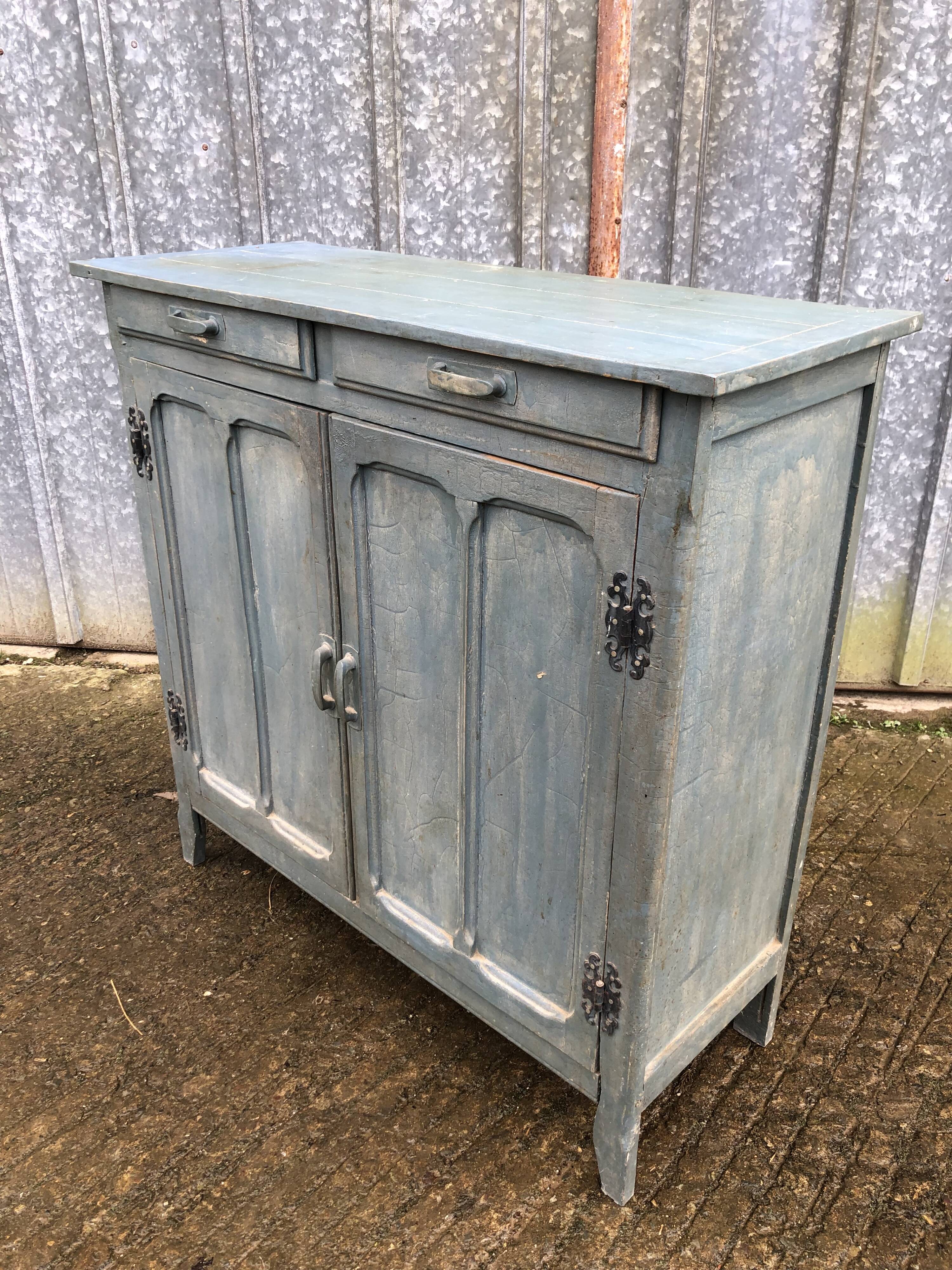 Parisian sideboard painted in blue with 2 doors and 2 drawers.