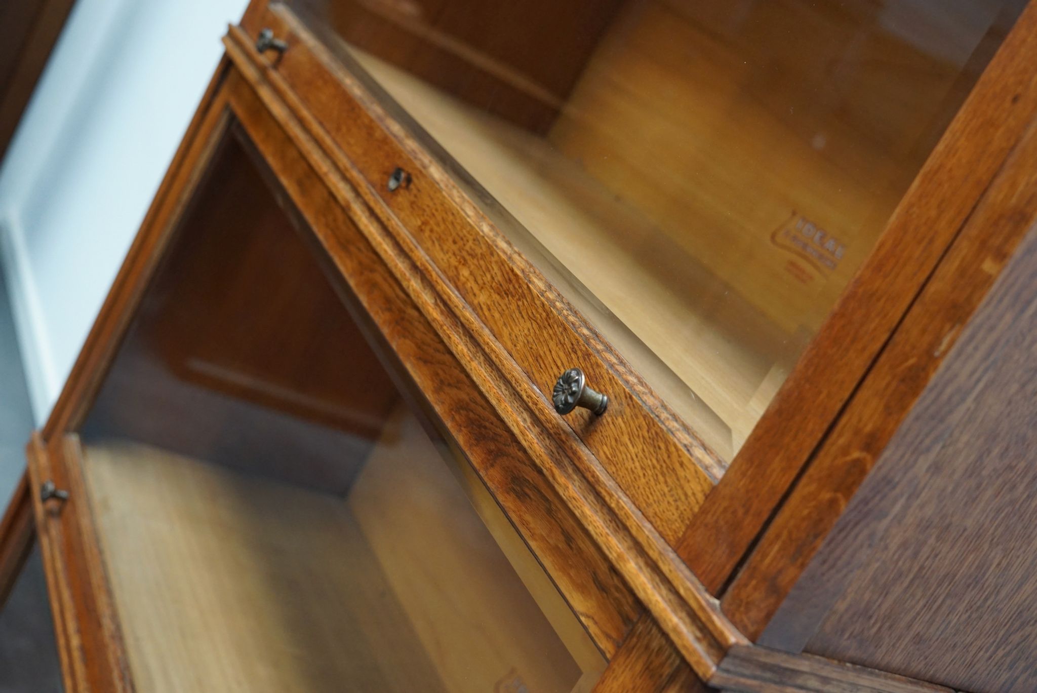 German oak bookcase with folding doors, ca 1900