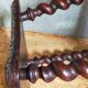Antique stool in turned and carved solid wood
