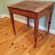 With knocking down old wooden school desk