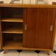 Vintage shoe cabinet with compass legs