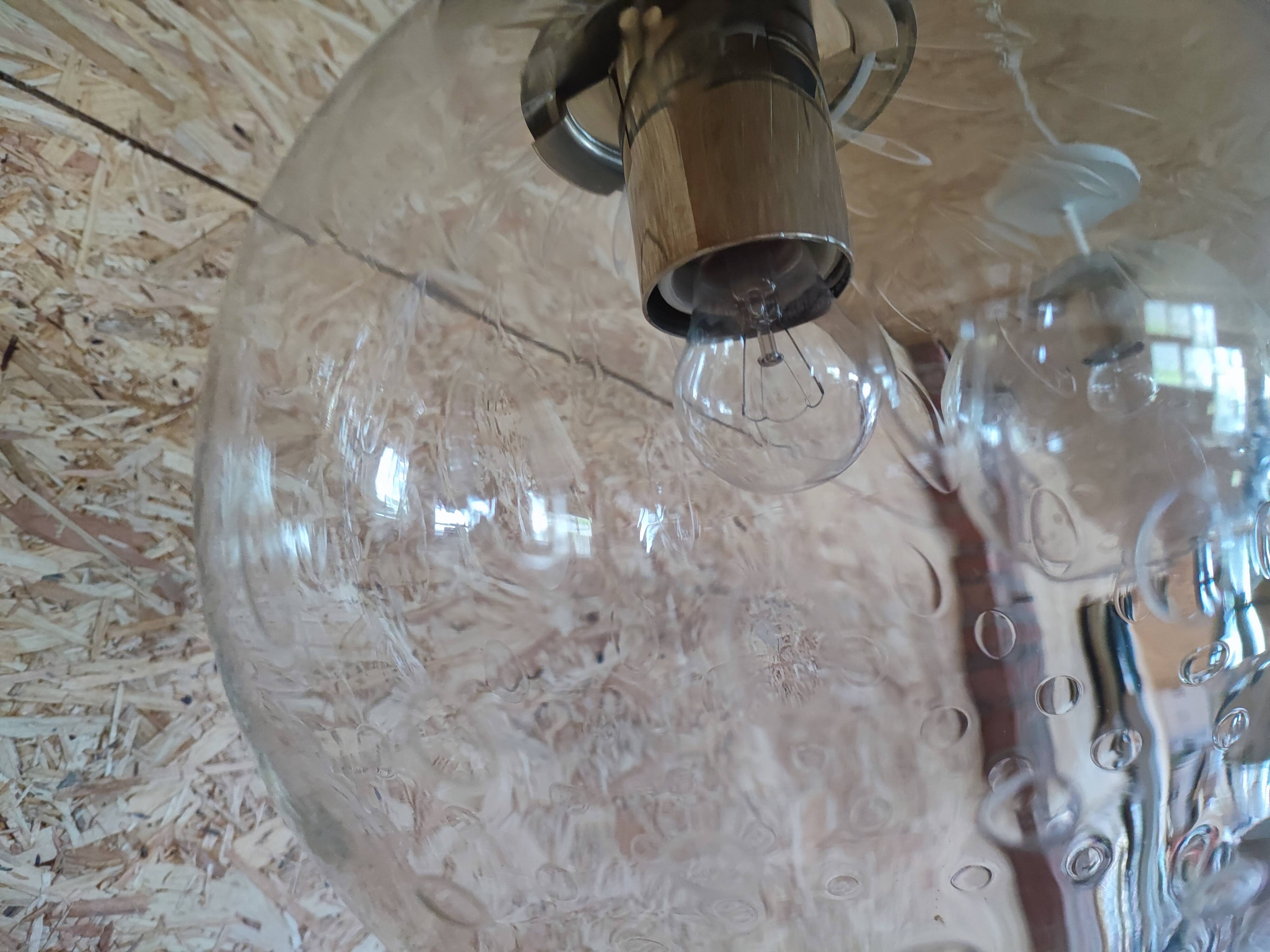 Bubbled glass globe pendant light. RAAK Amsterdam
