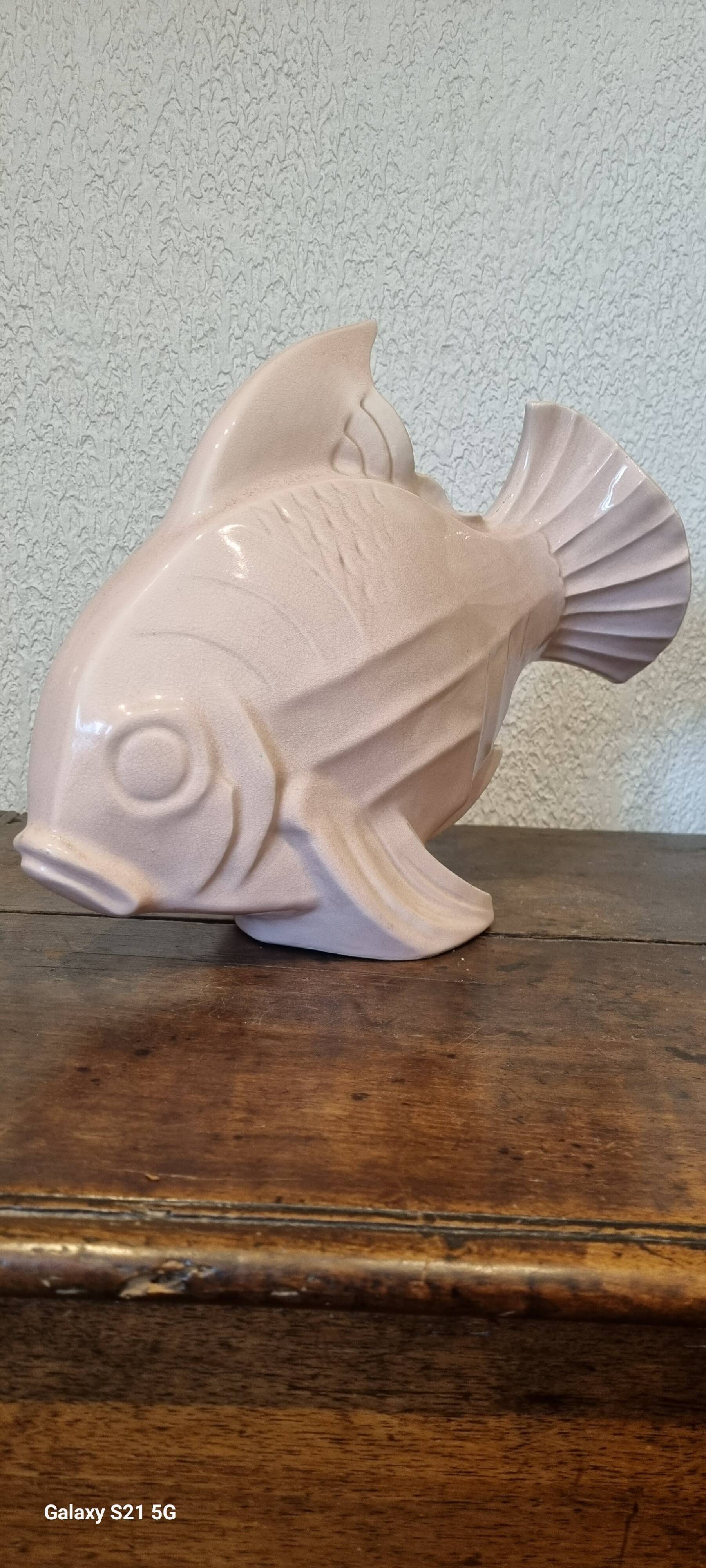 Poisson le jan signe