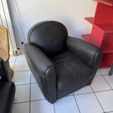 Matching black leather armchair – comfort and elegance