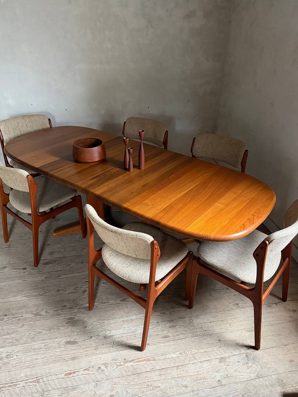 Vintage oval teak Scandinavian table with a central star base from Glostrup.