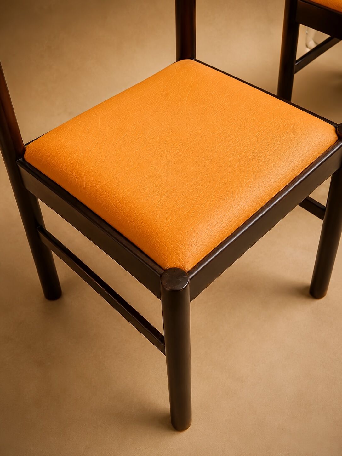 Set of 4 Mid-century beech / faux leather chairs.