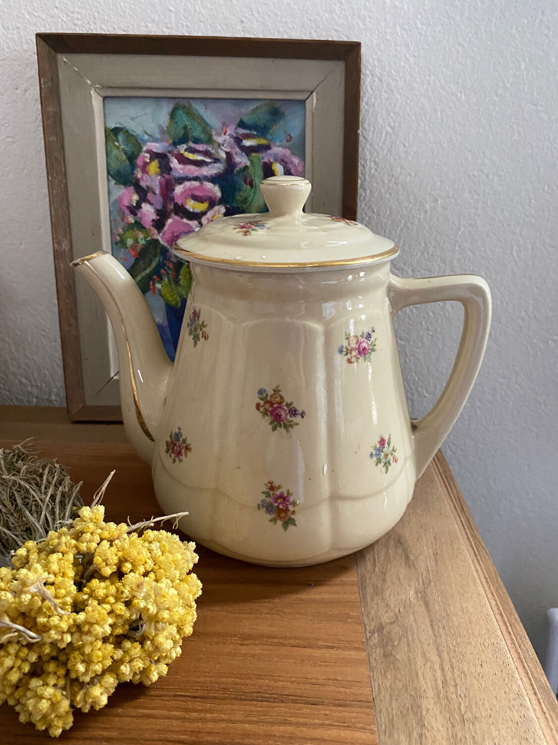 Old teapot or coffee maker in English style.