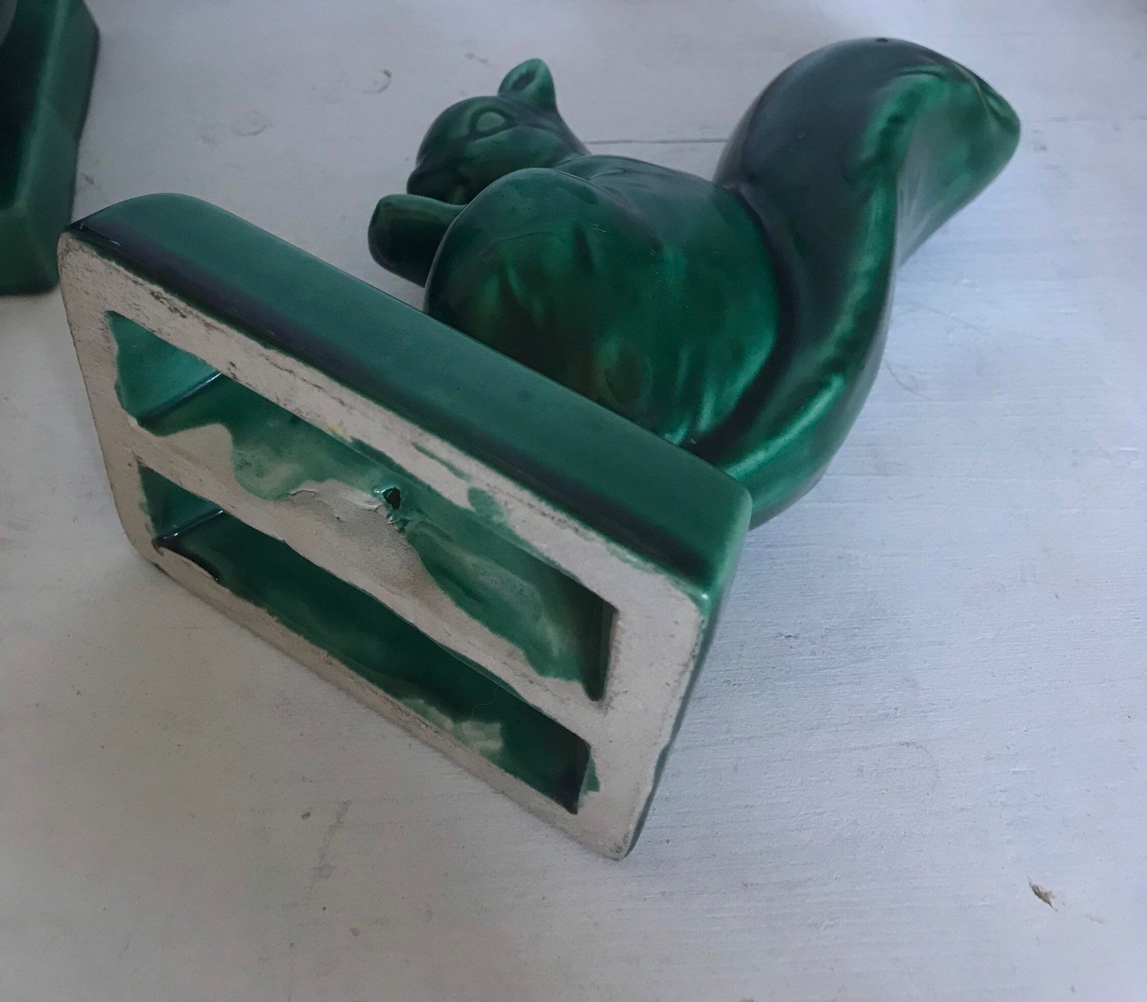 Pair of Art Deco ceramic book clamts