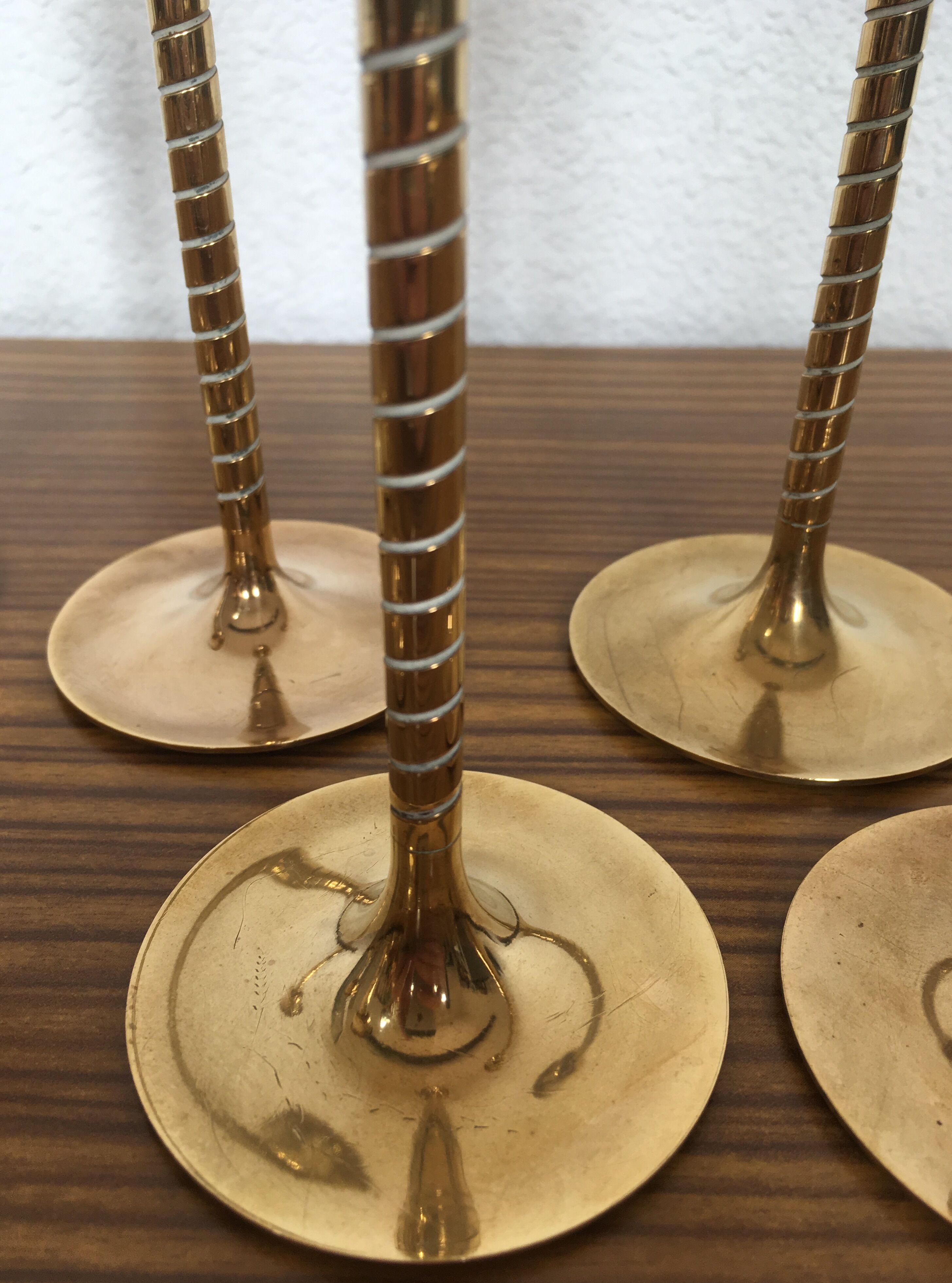 Series of 7 Scandinavian brass candlesticks