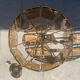 Brass and tinted glass pendant light