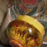 Old provencal pot cover in glazed terracotta