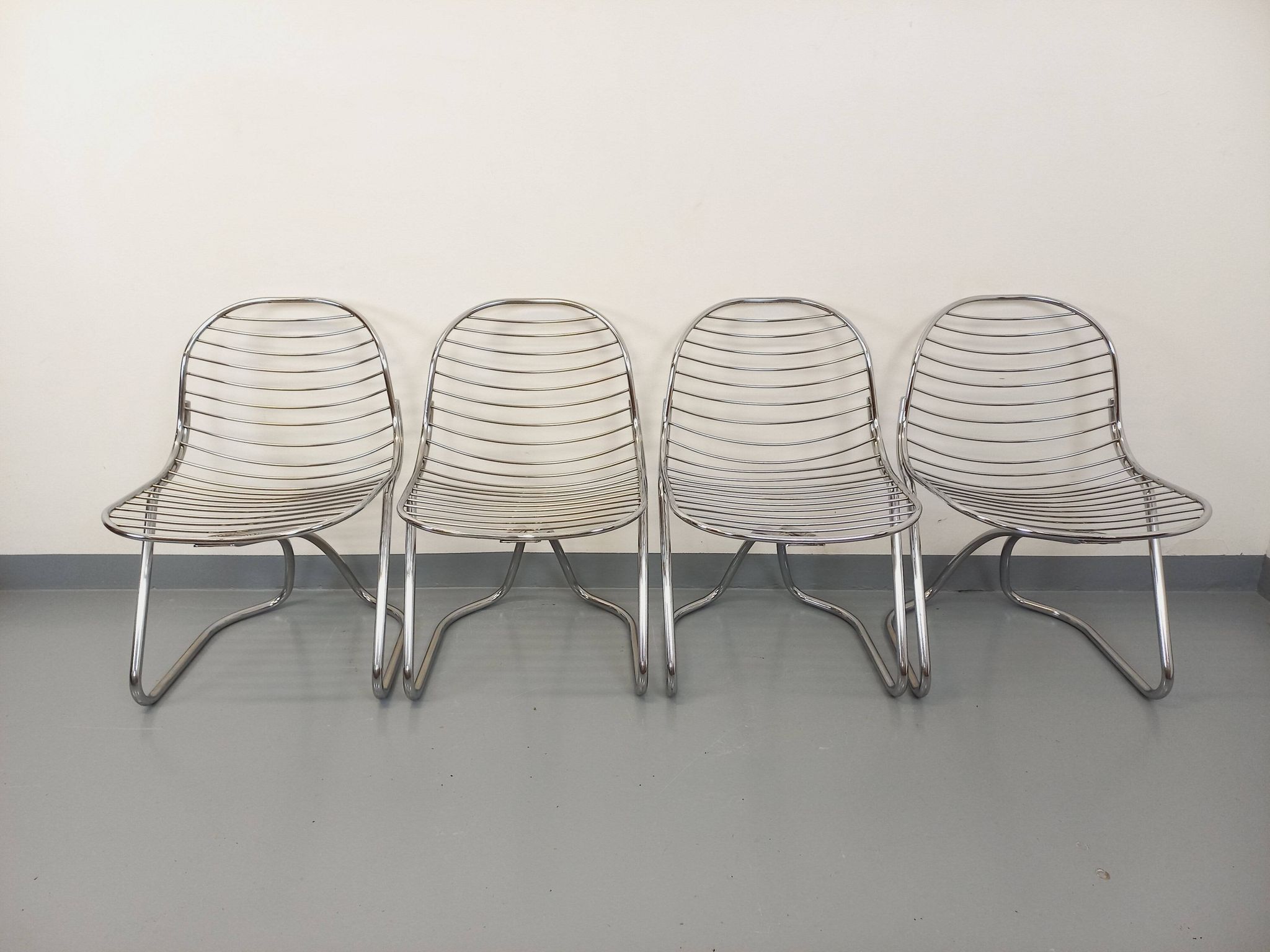 Set of 4 vintage Italian Gastone Rinaldi style chairs in chrome metal
