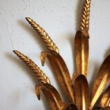 Applies "wheat sheaf" gold metal